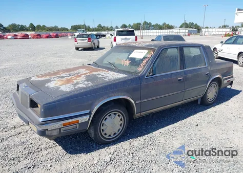 1989 Chrysler New Yorker C-Body z USA, uszkodzony, nr VIN 1C3BC4632KD573698